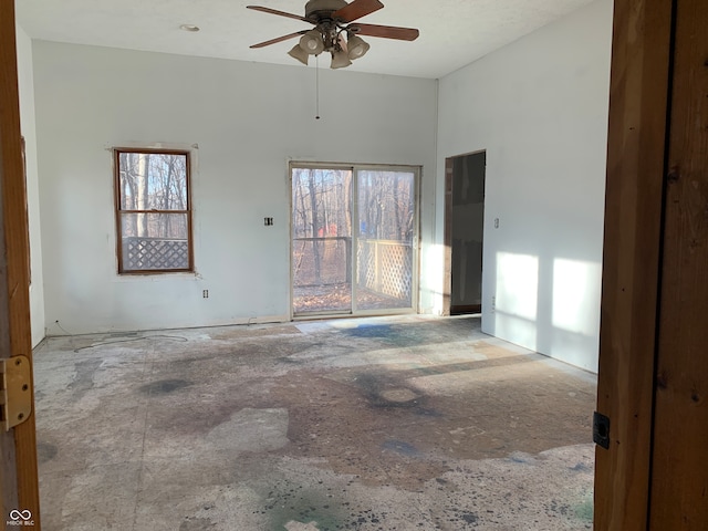 unfurnished room with ceiling fan