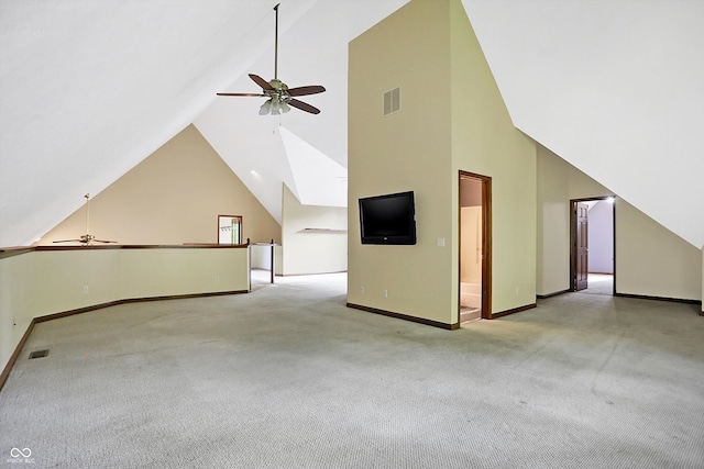 additional living space featuring light carpet, vaulted ceiling, and ceiling fan