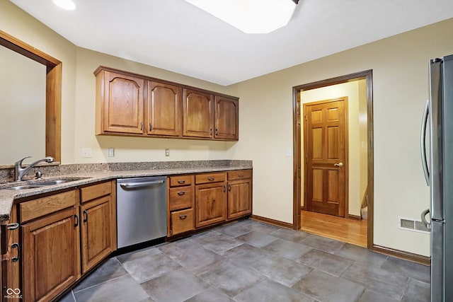 kitchen with sink and stainless steel appliances