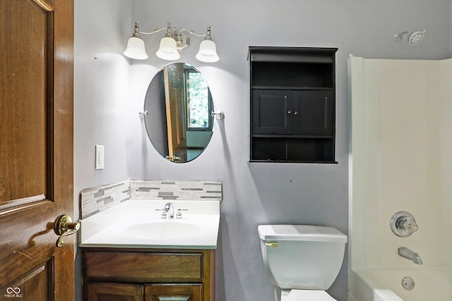 full bathroom featuring backsplash, shower / bathing tub combination, vanity, and toilet