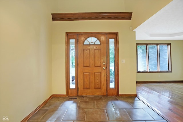 entrance foyer featuring dark hardwood / wood-style flooring