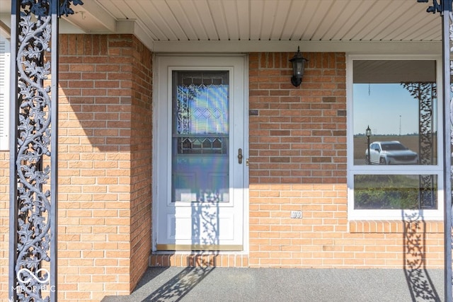 doorway to property featuring a porch