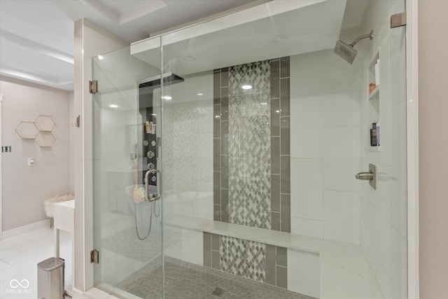 bathroom featuring tile patterned floors and an enclosed shower