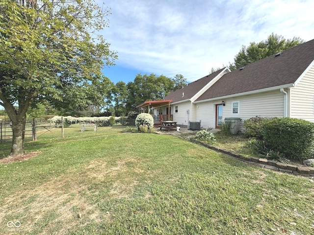 view of yard with central AC unit