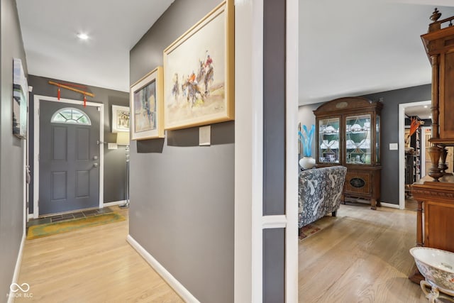 hallway featuring light wood-type flooring