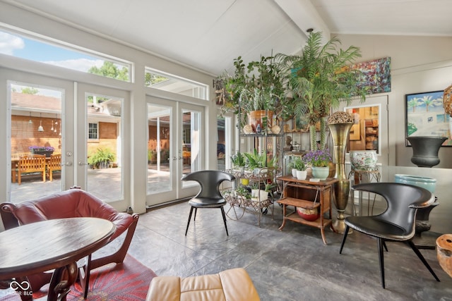 sunroom featuring french doors and lofted ceiling with beams