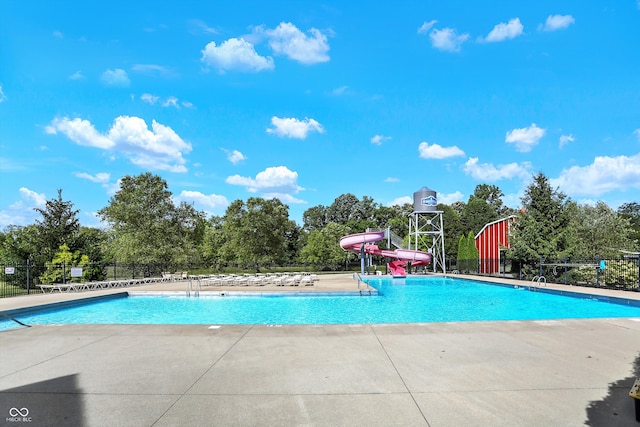 view of pool featuring a water slide