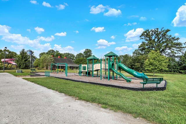 view of play area featuring a lawn