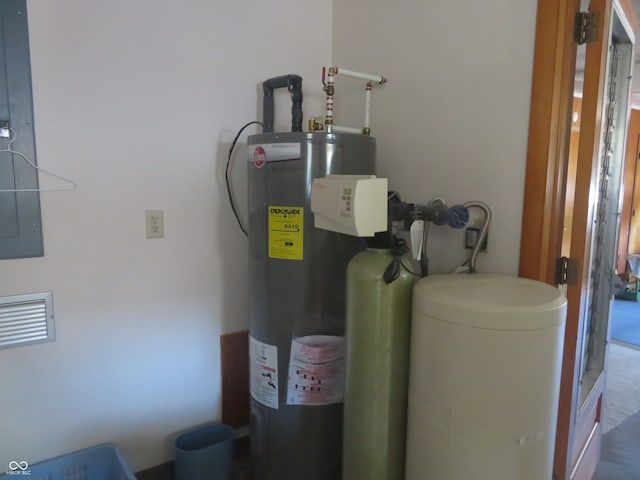 utility room with water heater