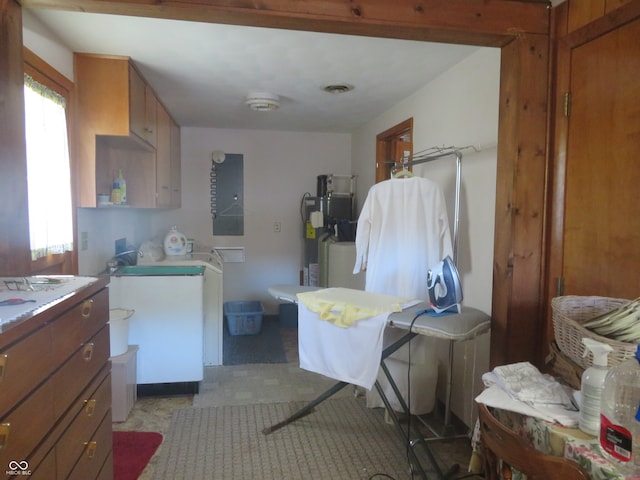 interior space with washer / dryer and water heater