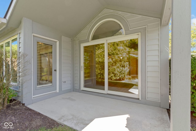 property entrance with a patio