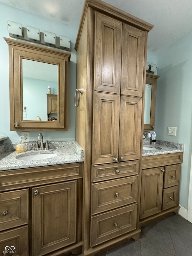 bathroom featuring vanity and tile patterned floors