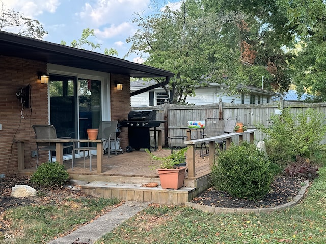 view of yard featuring a wooden deck