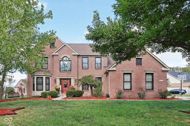 view of front of home with a front lawn