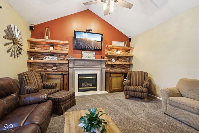 living room featuring ceiling fan, carpet, and vaulted ceiling