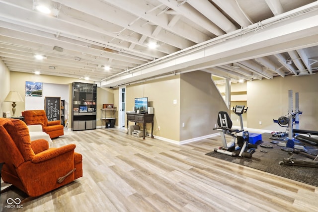 workout area featuring hardwood / wood-style flooring