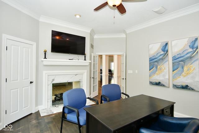 office area featuring ceiling fan, dark hardwood / wood-style flooring, and ornamental molding