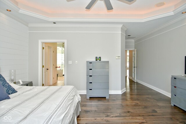 bedroom featuring ornamental molding, multiple windows, ceiling fan, and dark wood-type flooring