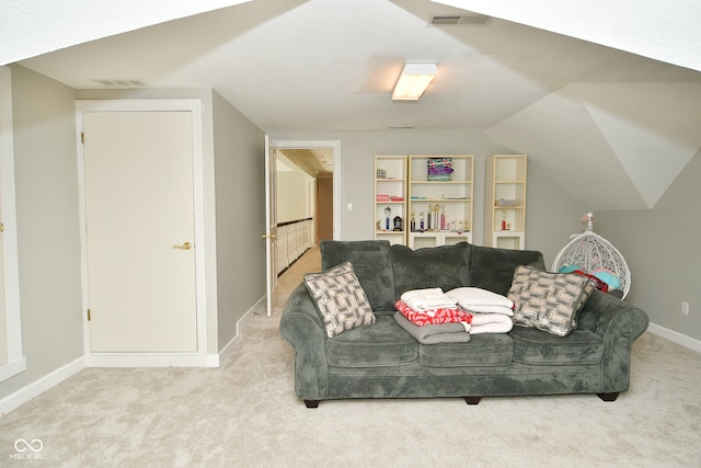 living room with carpet and vaulted ceiling