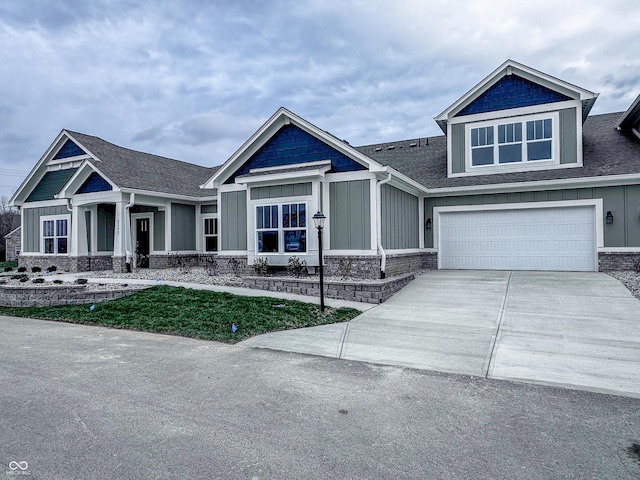 craftsman-style home with a garage