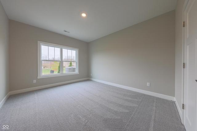 view of carpeted spare room