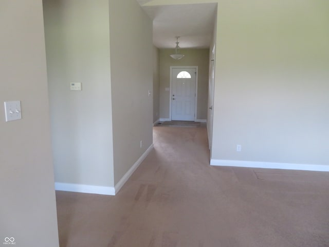 entrance foyer with light carpet