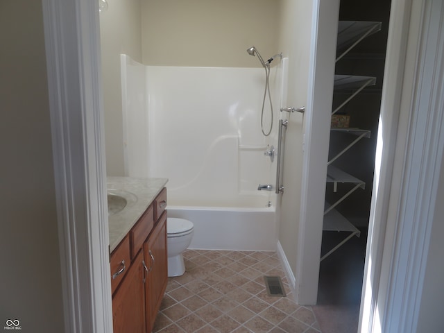 full bathroom with vanity, toilet, bathtub / shower combination, and tile patterned floors