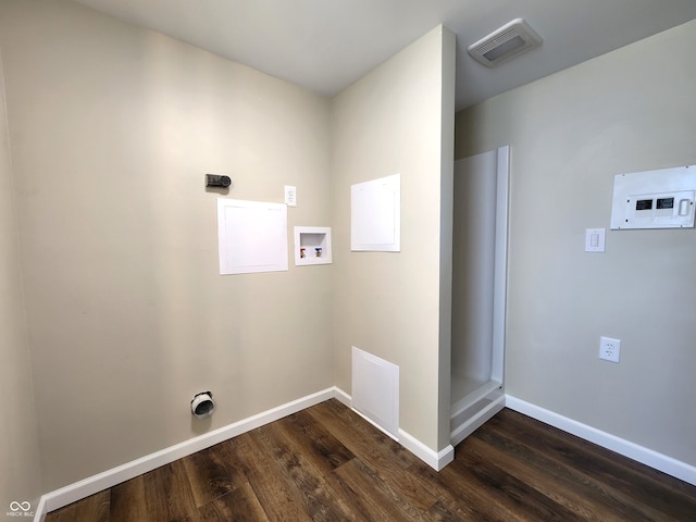 laundry room featuring dark hardwood / wood-style flooring and washer hookup