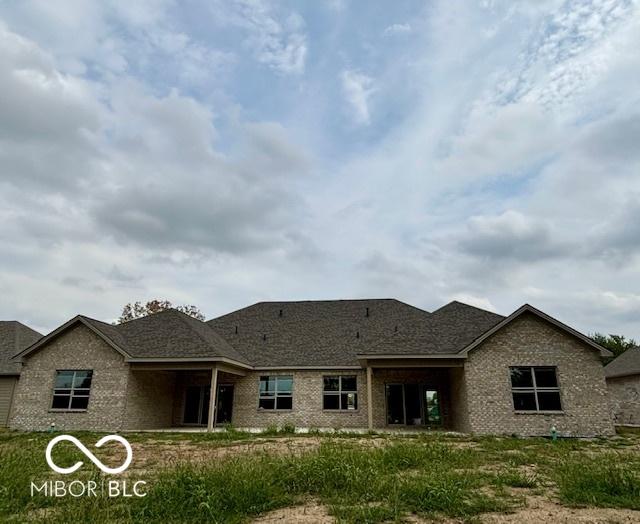 view of front of property featuring brick siding