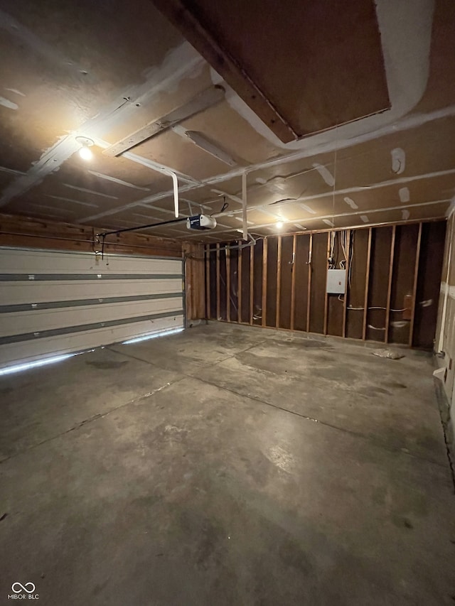 garage featuring a garage door opener