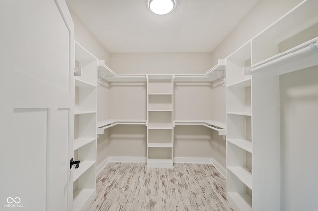 2841 Grandview Ln, Greenwood, IN 46143 - spacious closet with wood finished floors
