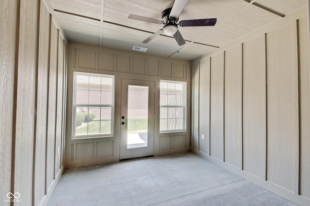 2841 Grandview Ln, Greenwood, IN 46143 - interior space featuring a decorative wall, a ceiling fan, and carpet