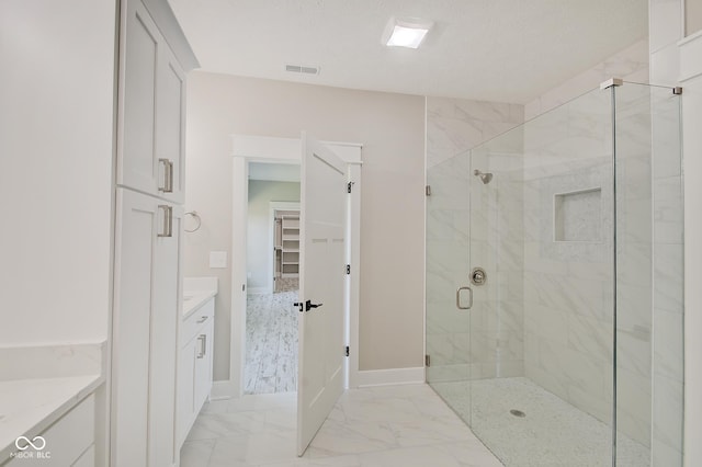 2841 Grandview Ln, Greenwood, IN 46143 - full bath featuring visible vents, baseboards, vanity, marble finish floor, and a stall shower