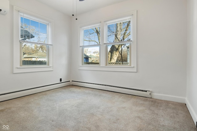 carpeted spare room featuring an AC wall unit, a healthy amount of sunlight, and a baseboard heating unit