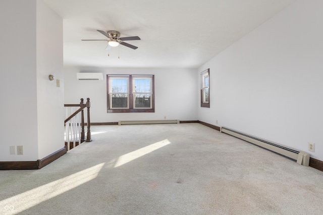 empty room featuring a wall mounted air conditioner, light carpet, ceiling fan, and a baseboard heating unit