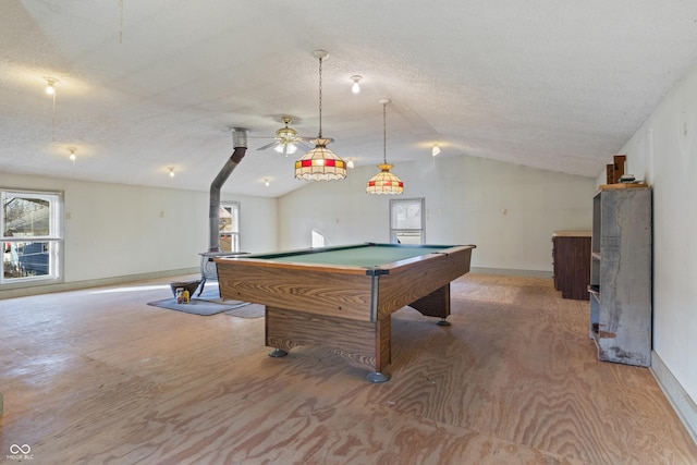 playroom with a textured ceiling, vaulted ceiling, and pool table