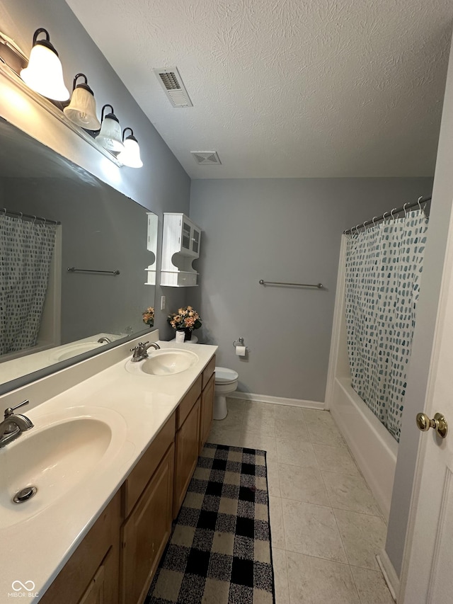 full bathroom featuring a sink, visible vents, and toilet