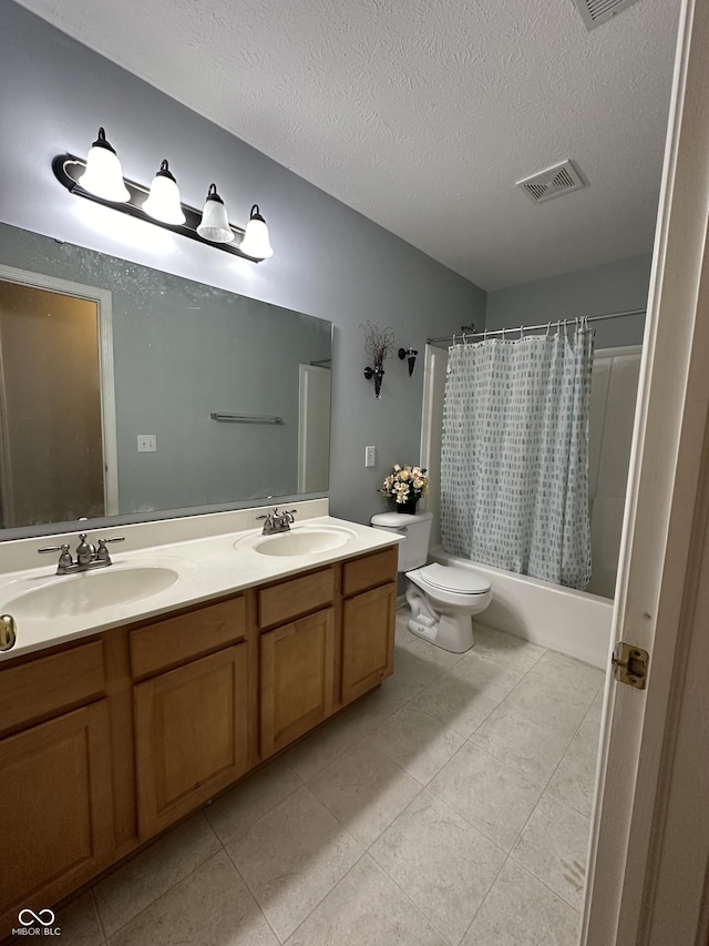 full bath with tile patterned flooring, toilet, visible vents, and a sink