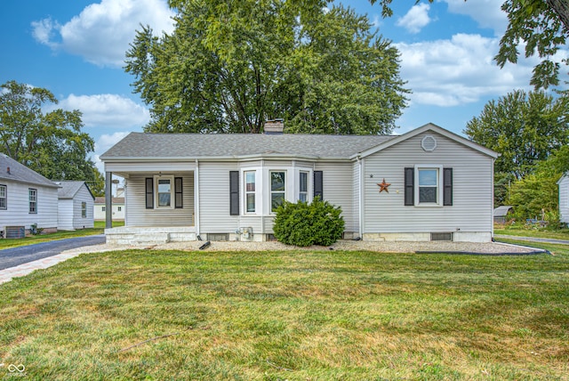 view of front of home with a front yard