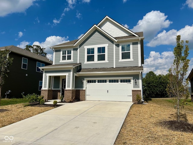 craftsman house with a garage and covered porch