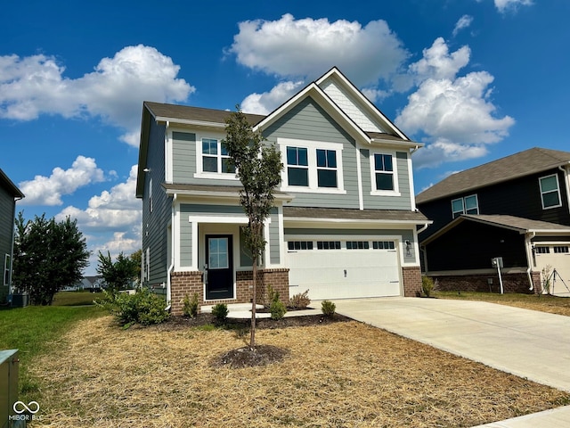 craftsman inspired home with a front yard and a garage