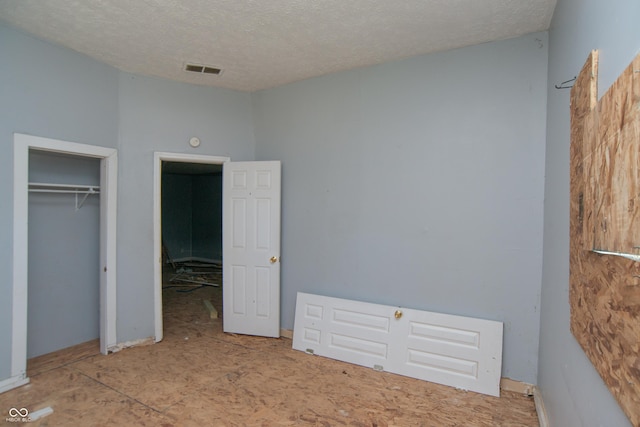 2363 N Gale St, Indianapolis, IN 46218 - unfurnished bedroom featuring a textured ceiling