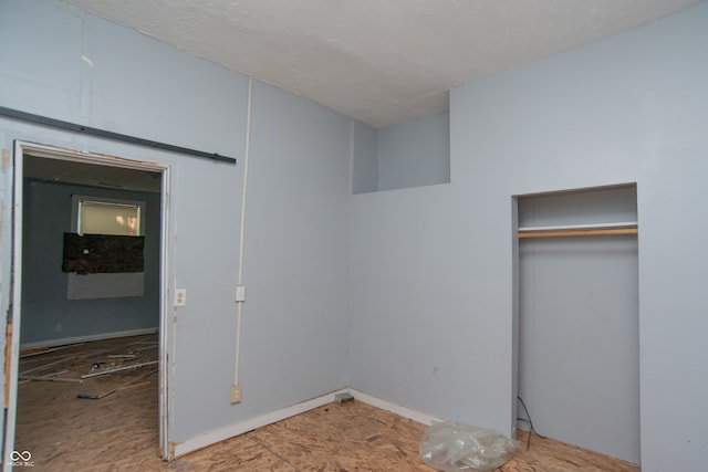 unfurnished bedroom with a closet