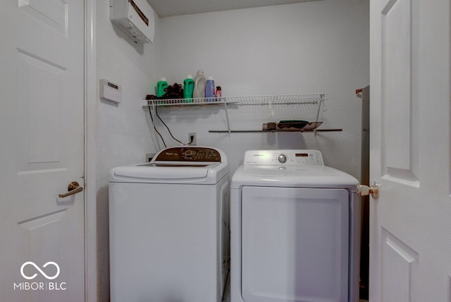 laundry area featuring separate washer and dryer