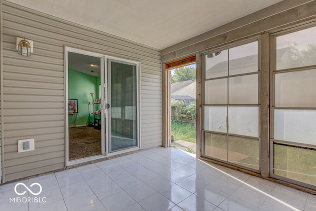 view of unfurnished sunroom