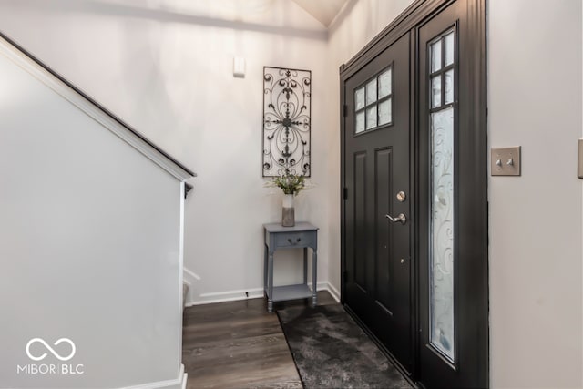 entrance foyer with dark hardwood / wood-style flooring