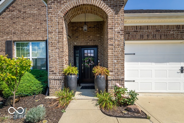 entrance to property featuring a garage