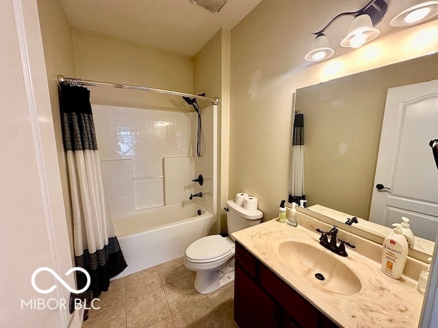 full bathroom featuring tile patterned floors, shower / bath combination with curtain, toilet, and vanity