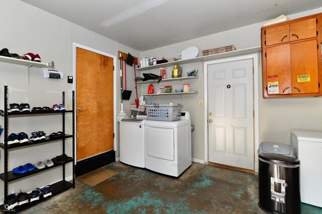 laundry room featuring independent washer and dryer