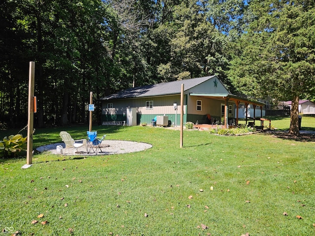 view of yard with central air condition unit